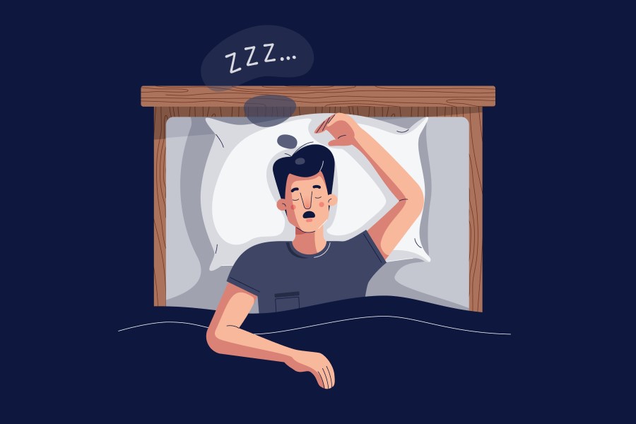 Mężczyzna chrapie podczas snu, może cierpieć na obturacyjny bezdech senny.